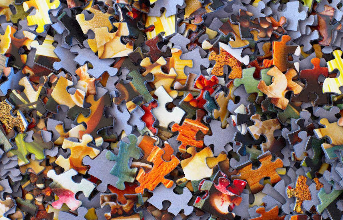 Assorted jigsaw puzzle pieces.